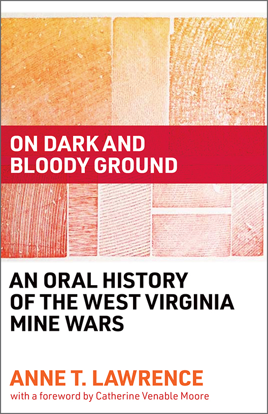 An Oral History of the West Virginia Mine Wars cover, wood grain print in red, orange, and yellow